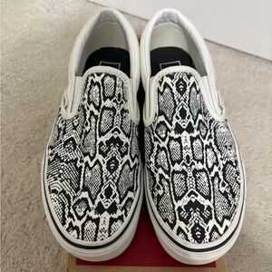 Vans women’s Slip-On Sneakers in Black and White Snake Print